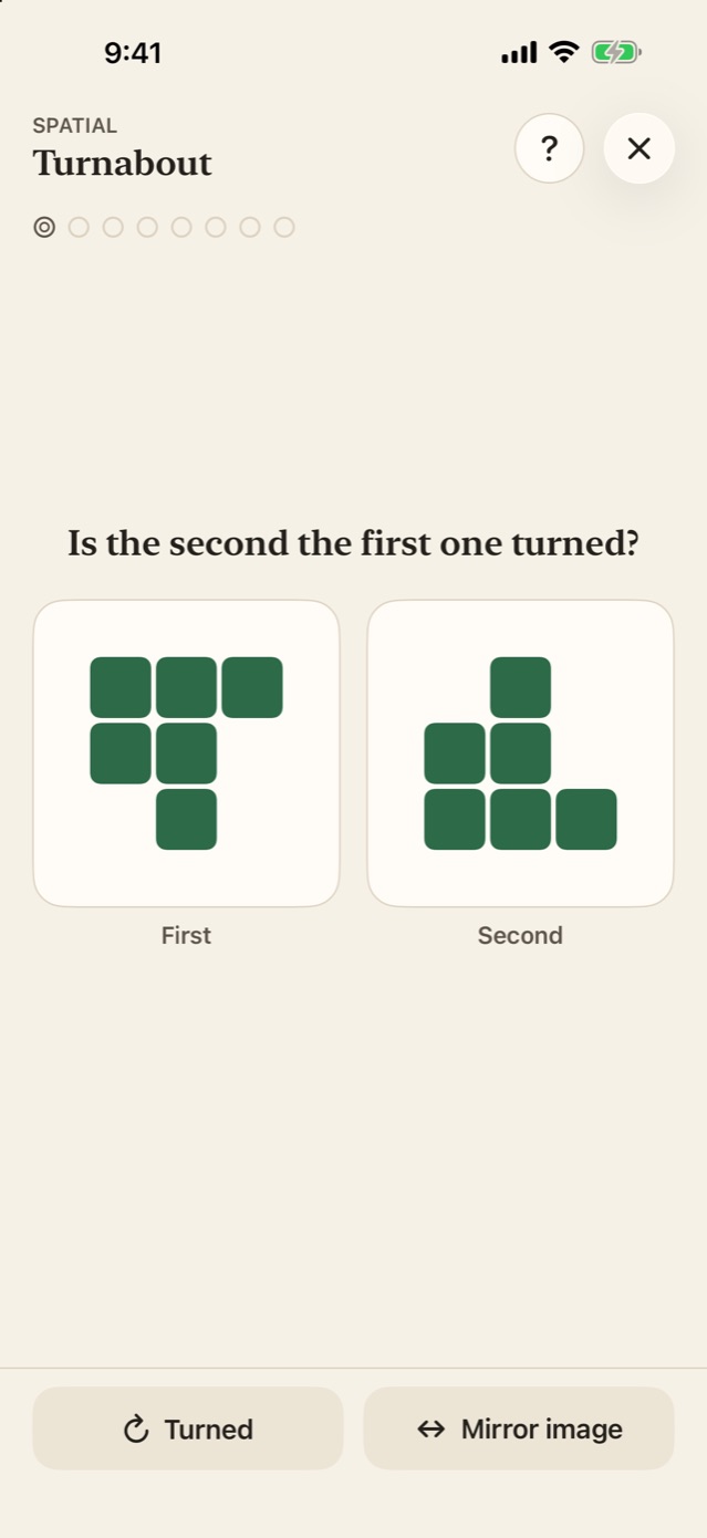 Brain Games Turnabout puzzle: two block shapes and the question, is the second the first one turned or a mirror image